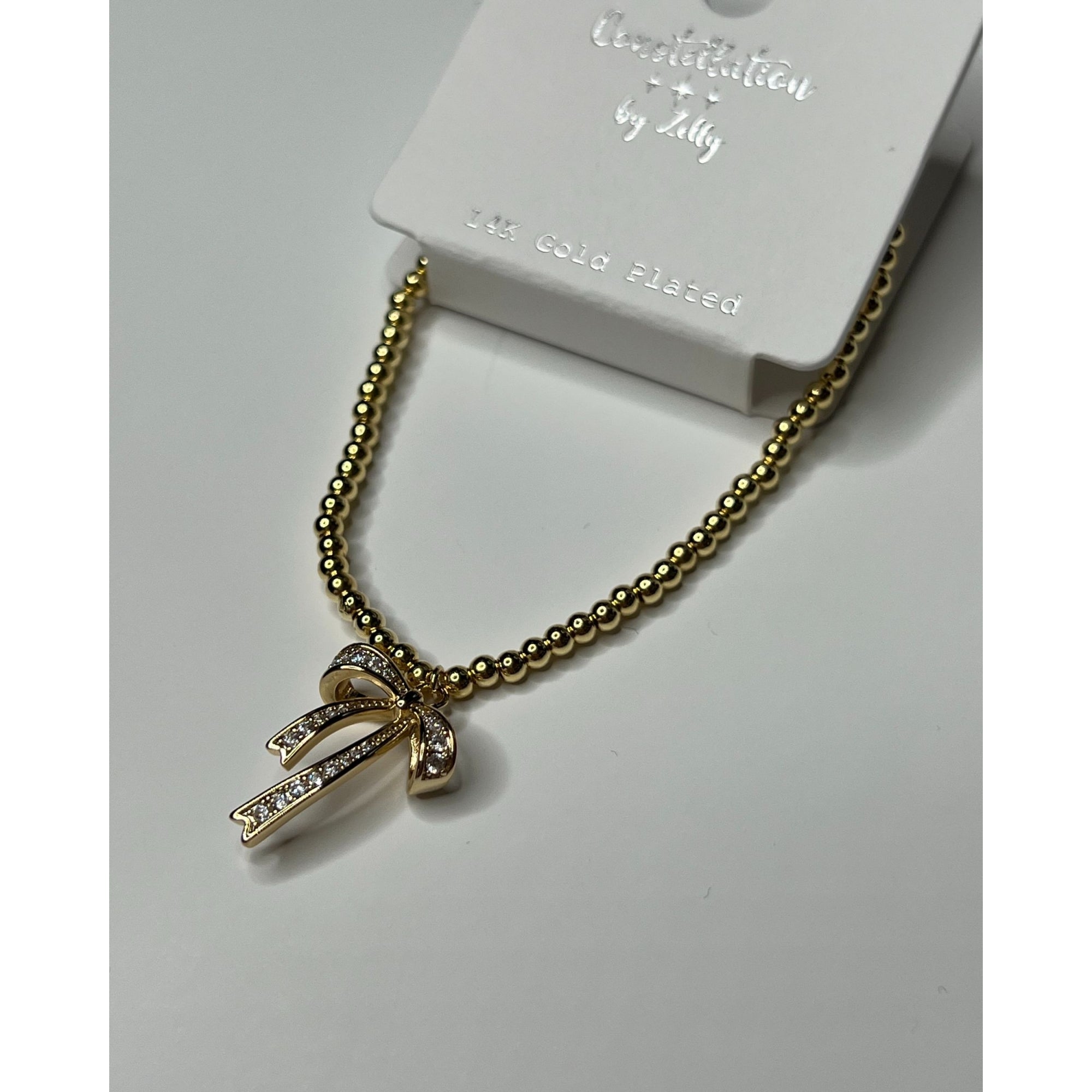 Zelly Small Bead Bracelet With Diamante Bow Gold