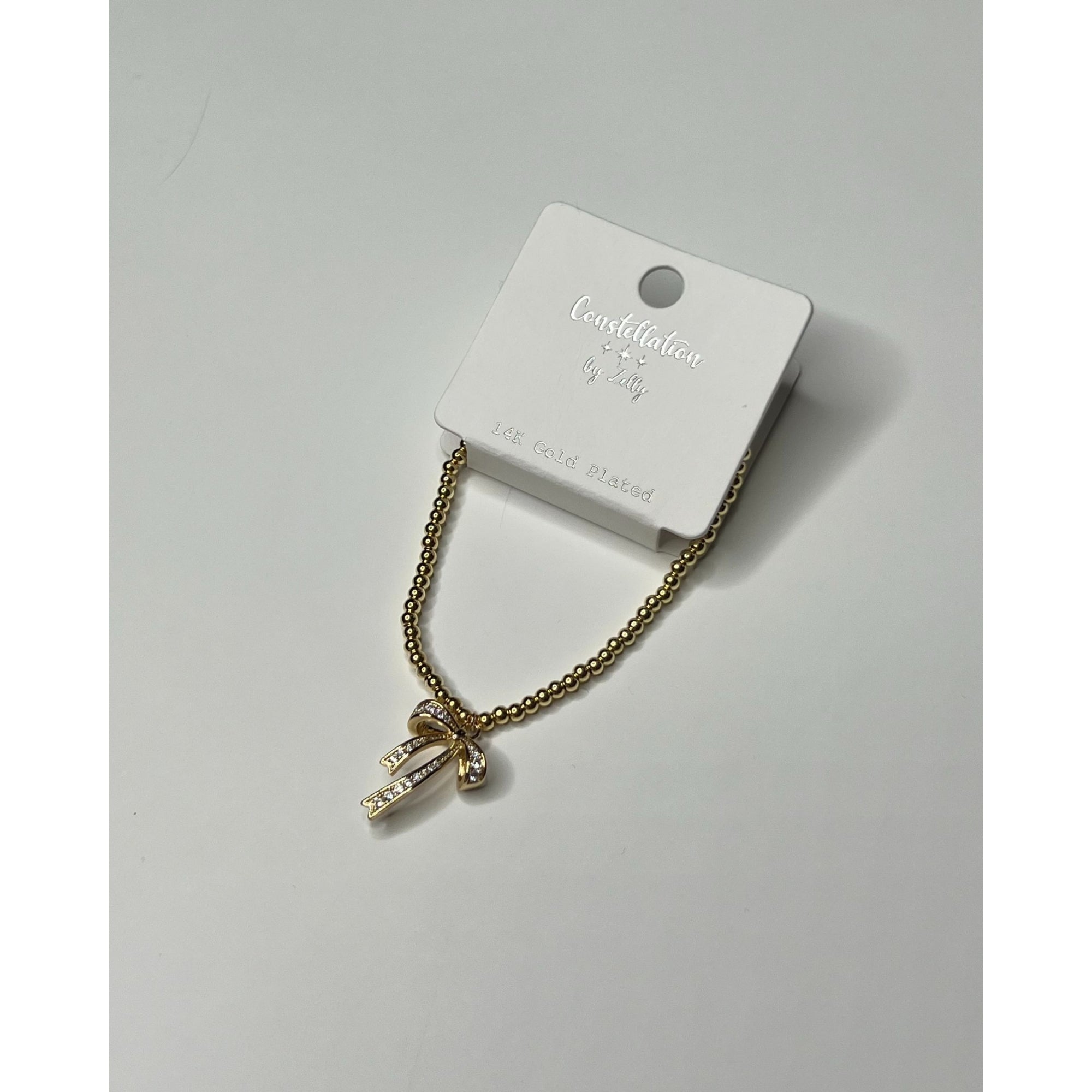 Zelly Small Bead Bracelet With Diamante Bow Gold